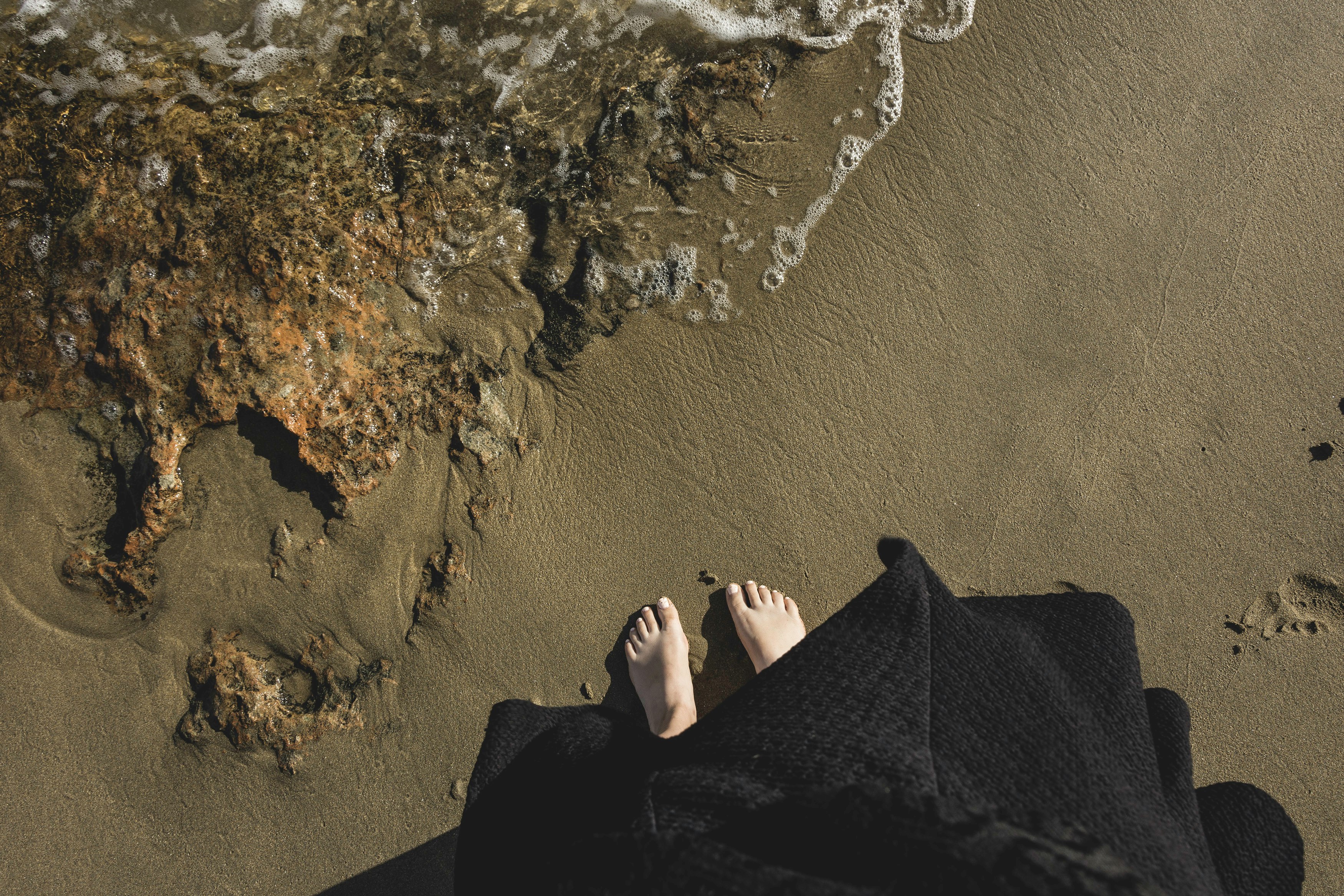 person standing on seashore